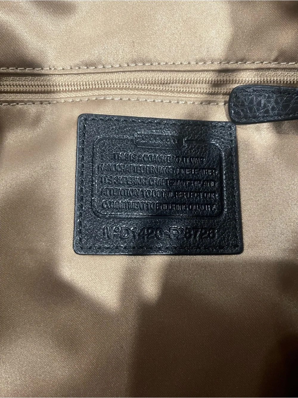 Coach Black Leather Tote with Brown Charm